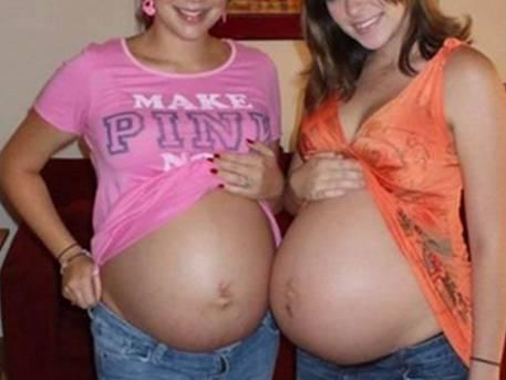 Matching pregger bellies are out.